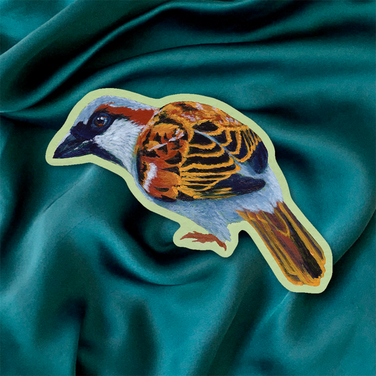 Sticker of a sparrow on teal fabric