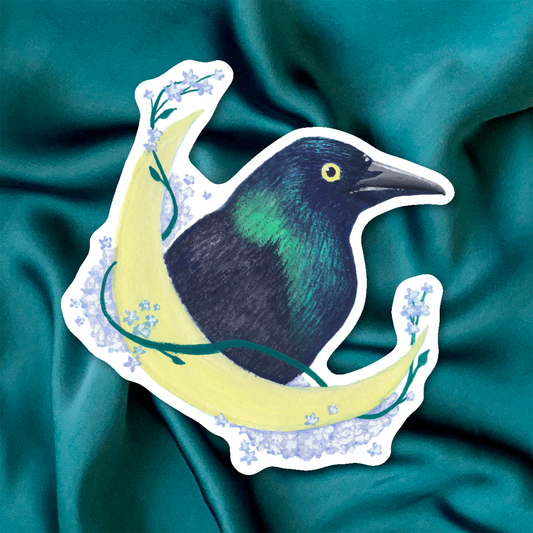 Sticker of a bird on a yellow crescent moon with flowers against a beige background